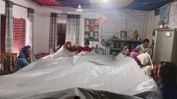 বৃষ্টিতে মাথায় পলিথিন দিয়ে চলছে শিক্ষকদের দাপ্তরিক কাজ