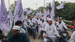 কোটালীপাড়ায় কালিমার পতাকা নিয়ে মোটরসাইকেল শোভাযাত্রা